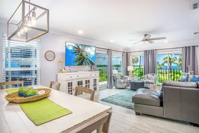 Paradise Pointe updated 2bed/2. 5bath townhouse style condo with partial water views, shared pool & dockage