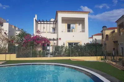 Poolside villa with private access from terrace.