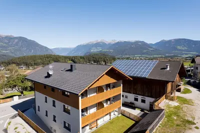 Image de Appartement de vacances 'Obergasserhof Waldruhe' avec vue sur les montagnes, jardin partagé et Wi-Fi