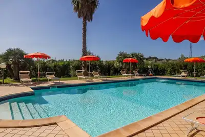 Image de Appartement 'Farfalla' avec piscine partagée, Wi-Fi et climatisation