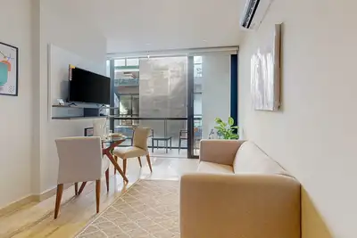 Modern condo with rooftop pool, plunge pool, gym, & balcony