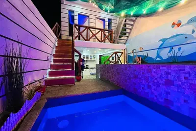 Image de Affordable Cozy rest house with pools, free wifi and parking on site