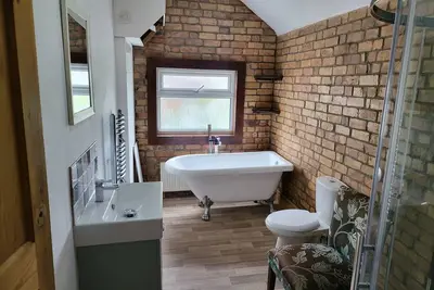 Image de Beautiful house suitable for up to 7 people\nclose to Stadium, hospitals & Uni\n