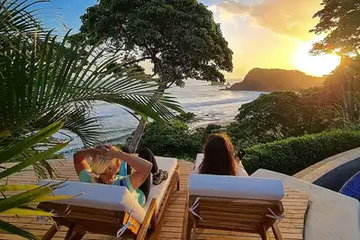Image de Beachfront infinity pool area - Direct beach access - Forest and tropic gardens.