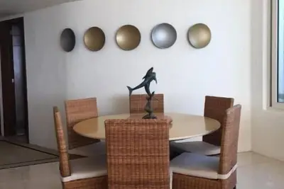 Image de Beachfront apartment less than 10 steps from the beach.