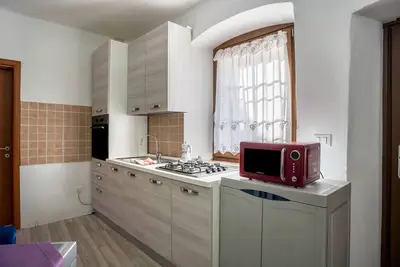 Image de Appartement 'La Vecia Casa Apartament' avec vue sur la montagne et terrasse partagée