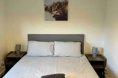 Image de The Heilan' Coo Apartment