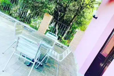 Image de Aparthotel & Rooms   Residenza Locci    Appartement 1 Chambre Avec Terrasse dans la verdure au centre de Teulada.