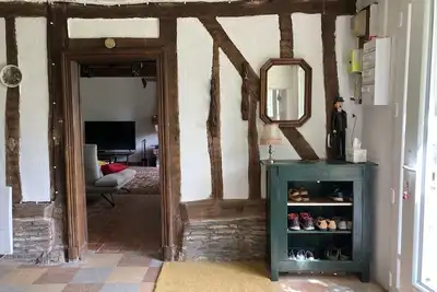 Image de Longère renovée, maison de campagne à colombage avec cheminée proche foret.