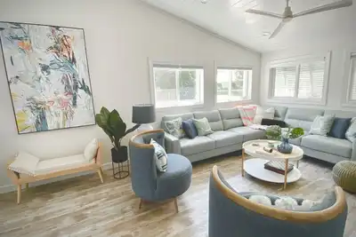 Image de Modern coastal getaway with hot tub, putting green and private backyard oasis.