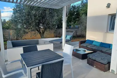 Image de Casa Favolosa jusqu’à 4 personnes, bain à remous et terrasse privés entre oliviers et mer