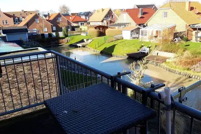 Image de Schöne Helle Ferienwohnung Silbermöwe Og Direkt an den Greetsieler Grachten