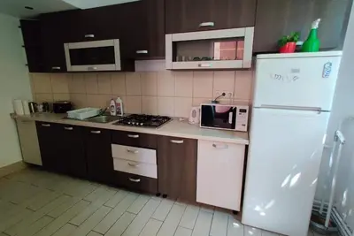 Image de Big Family Apartment is a central apartment in Satu Mare Apartments building.