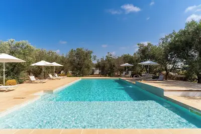 Image de Appartement de vacances \"Domus Mea Salento Arazzo Rosso\" avec piscine partagée et Wi-Fi