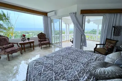 Suite with two pools, ocean view balcony, & walk-in shower- beach minutes away!