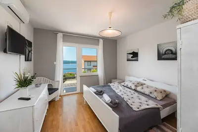 Image de Appartement de vacances avec vue sur la mer et terrasse privée