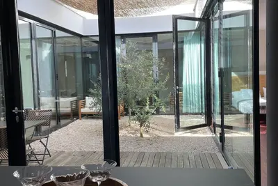 Image de 160 sqm atrium luxury apartment, fireplace, sauna, rowing machine, Bbq, large terrace, forest
