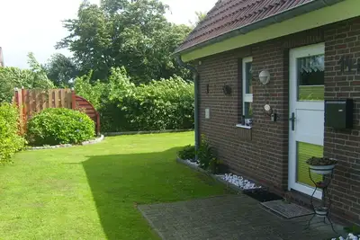 Image de Maison de vacances 'Haus Deichbrise' avec terrasse privée, jardin privé et Wi-Fi