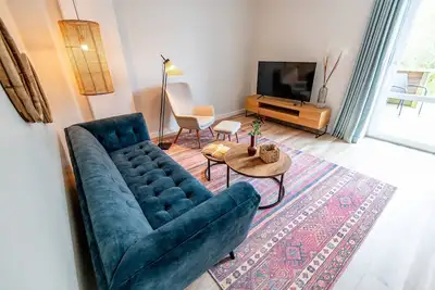 Image de Renovierte Ferienwohnung mit Großzügiger Terrasse und Gartenteil