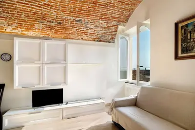 Image de Appartement 'Actis2, Borgo Dei Pescatori' avec balcon, Wi-Fi et climatisation
