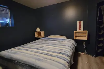 Image de À 15 minutes du village piétonnier de Mont-Tremblant, un immense chalet avec spa