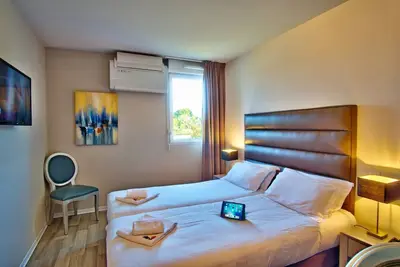 Image de Indulge in Home Like Comfort! Free Parking, Pets Are Allowed!