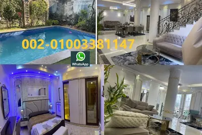 Image de 5 bedrooms modern Trio villa  coverable warm private pool sheik zayed compound