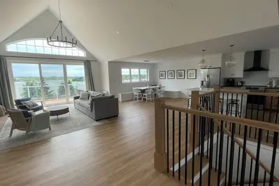 Image de New waterfront cottage, gorgeous views of the Sou'West River, minutes to beaches