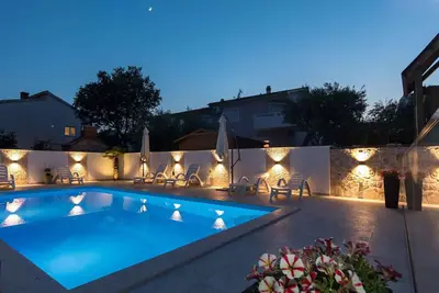 Image de Appartement de vacances avec piscine d'eau salée chauffable