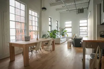 Chic Urban Loft with Waterfront Views\n