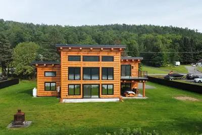 Image de Chalet un Air de Bois, chalet riverain en bois ronds