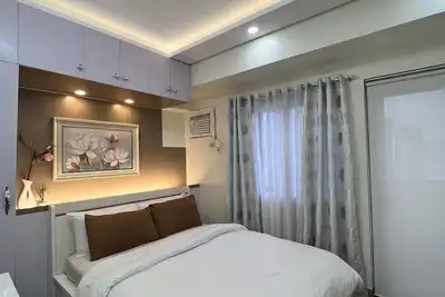 Image de Cozy and luxurious Family Room in Araneta Center