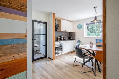 Image de Maison de vacances à Den Burg avec bain à remous