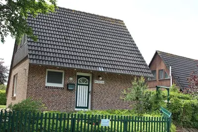Image de Dat Lüttje Huus am Hafen von Pilsum