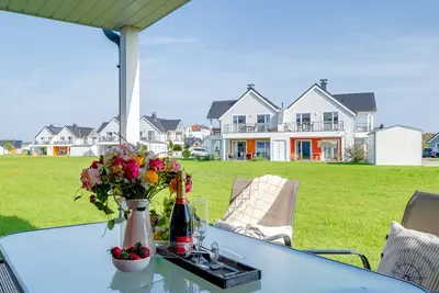 Image de Idefix - Strandnah, Infrarotsauna, Whirlwanne, Kaminofen, Terrasse, Stellplatz