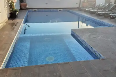 Image de Casa a 5 min da Praia com Piscina Coberta e Jacuzzi