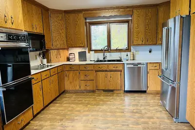 Image de A-Frame lodge on 40 acres in Elkhart Lake, Wi. walk to town. Sleeps 10