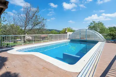 Image de Chalet \"Can Tronc\" avec vue sur la montagne, piscine partagée et Wi-Fi