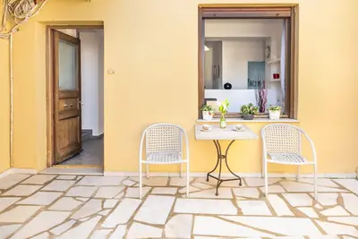 Image de Maison de vacances 'Garden Apartments' avec terrasse partagée, Wi-Fi et climatisation
