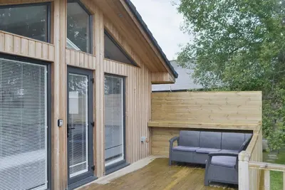 Image de Escape to Little Fawn Lodge, a serene three-bedroom retreat in Otterburn, Northumberland.