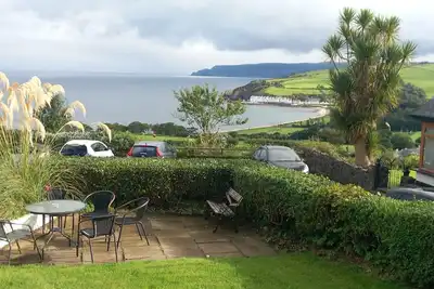 Image de Traditional 5 bedroom house overlooking Cushendun bay. Pet friendly.