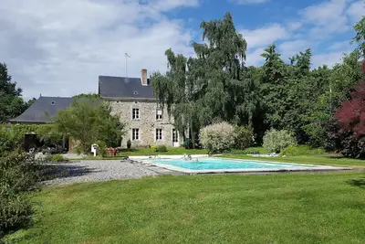 Lovely 9 bedroom house sleeping 18 with private pool in a tranquil setting.