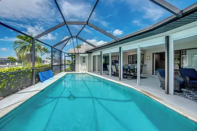 Image de Blue Mermaid Villa - Incredible 4 Br/3 bath Villa with heated pool, kayaks, bikes, and fishing poles