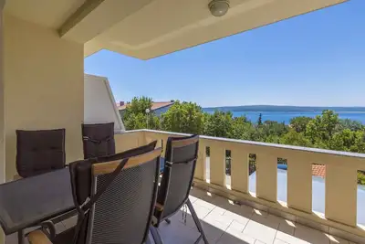 Image de Appartement de vacances avec air conditionné et vue sur la mer