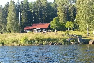 Image de Cottage right by the lake in Bergslagen with sauna and boat