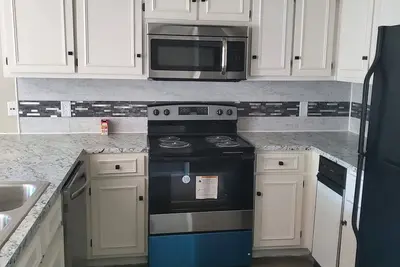 Image de \"Discover Urban Convenience, Charm, and Community Spirit in this home-from-home