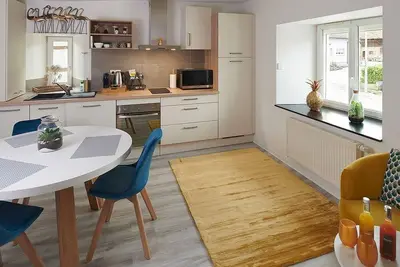 Image de Suite Or avec Sauna Privatif et Cuisine Équipée - Idéale pour un Séjour Relaxant en Alsace