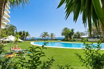 Beachfront apartment with pool