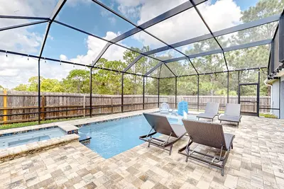 Image de Summerfield home with a fenced-in yard, pool, hot tub, & games
