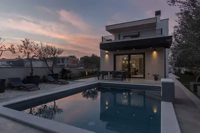 Image de Maison de vacances avec piscine et transats